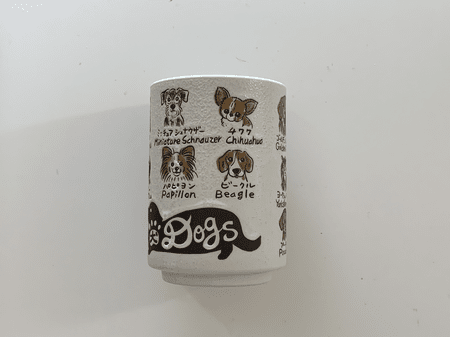 <b>Front of the cup </b><br>I used my phone to capture the front of the cup, showcasing its overall shape and the printed details on the front. I chose this object because it is a simple cylinder with unique printed designs.