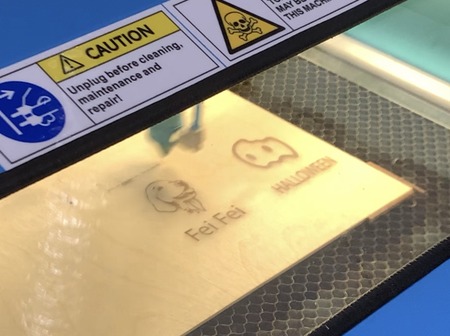 <b>Laser Cutting Process at Sheridan - Start</b><br>
          This shows the beginning of the laser cutting process at Sheridan’s laser cut room. The Halloween ghost design is being engraved onto the wood for the phone stand.