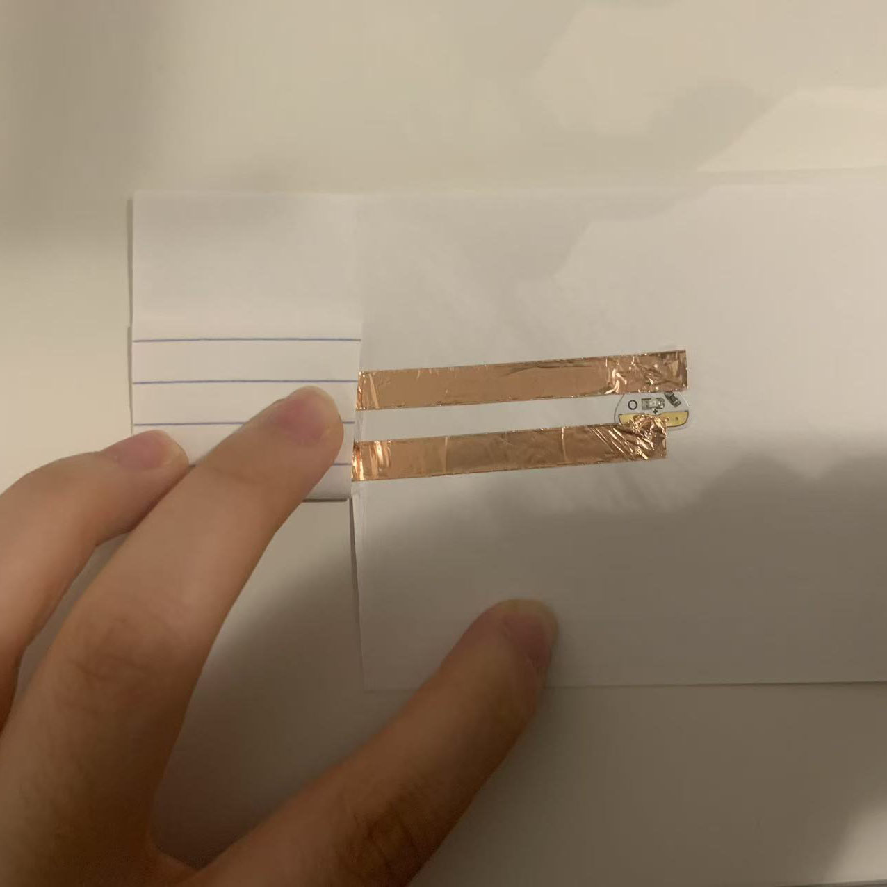 I assembled the circuit and pressed to test it. The LED lit up, showing my circuit works perfectly.