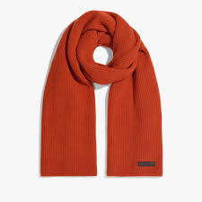 A simple scarf made of fabric with a cozy and warm appearance.