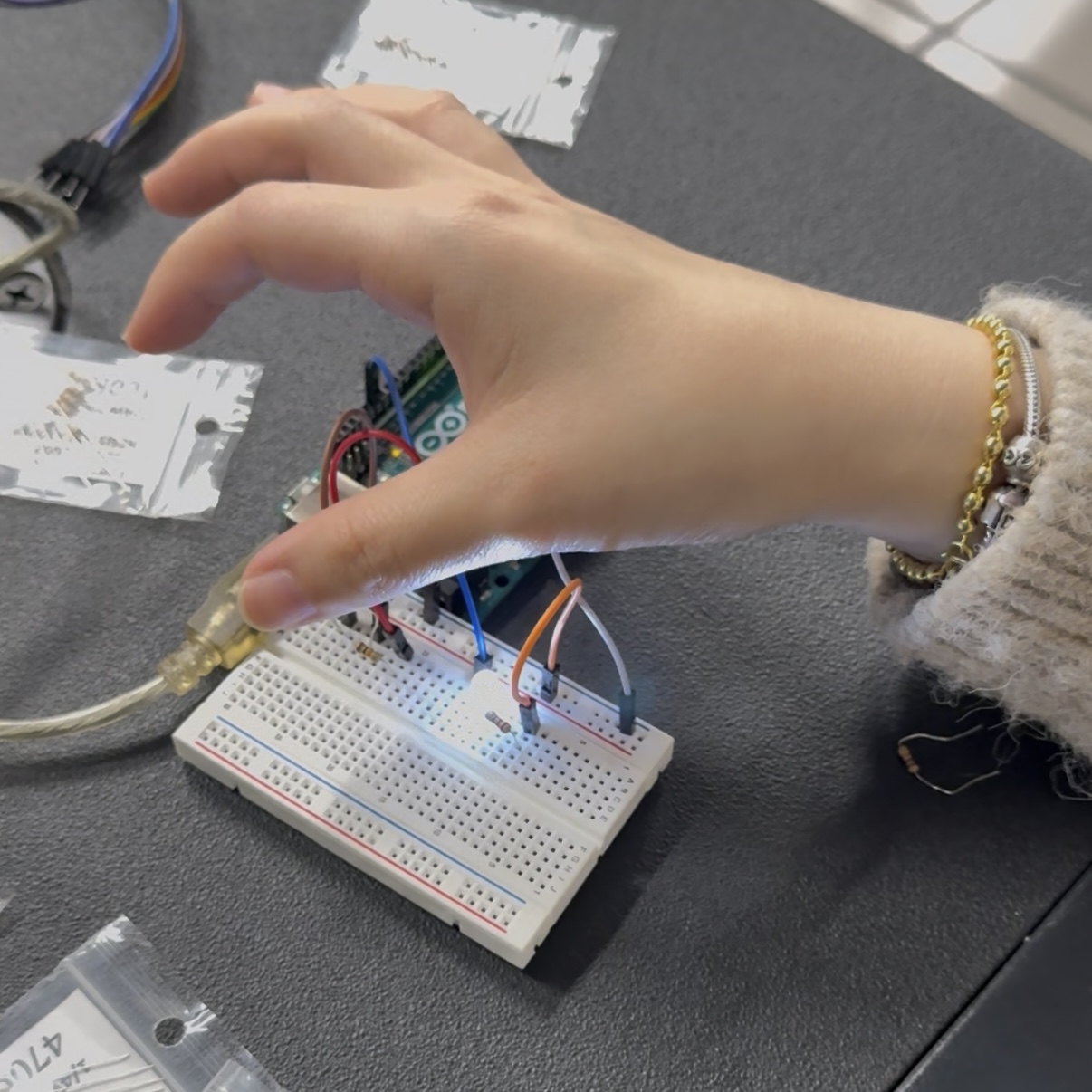 <b>LED Only Works After Adjusting Light Level</b><br>We managed to make the LED respond by adjusting the light level over the sensor. The LED only turned on when the sensor was covered, showing that the logic worked under specific conditions. This step confirmed that the circuit was correct, but the sensitivity still needed refinement.