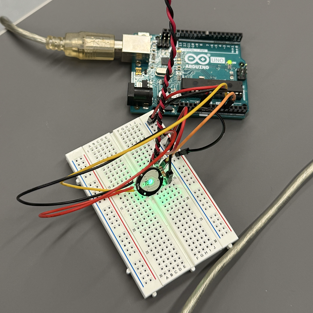 <b>Sensor connected on breadboard</b><br>We connected the sensor on the breadboard with Arduino to test if the wiring is correct. We checked the power, ground, and signal pin to make sure the sensor can send stable data to Arduino before linking it to TouchDesigner.